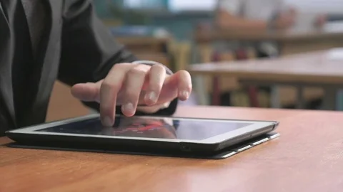 Man looking at photos using computer tablet 動画素材 82845805