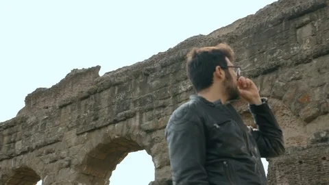 Man looking at the ruins in Rome. Stock Footage 106620388