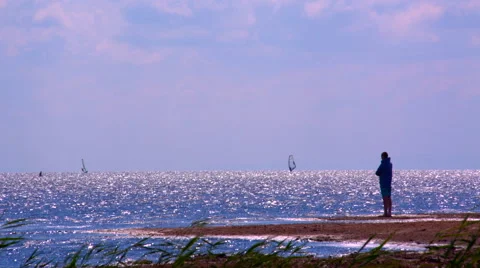 Man looking at the sea at dawn Stock Footage 51163494