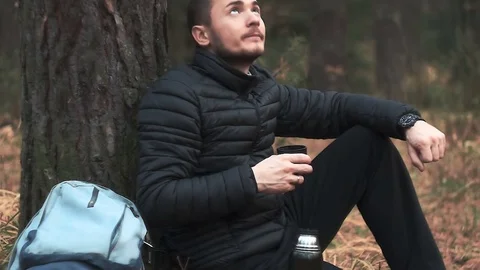 The man is looking up into the sky Stock Footage 82502828