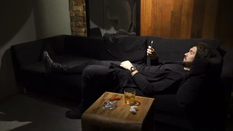 Man is looking in the smarphone Stock Footage 86258260