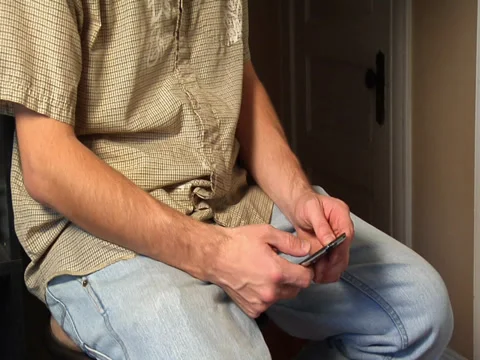 Man Looking At Smartphone Видео 31553170