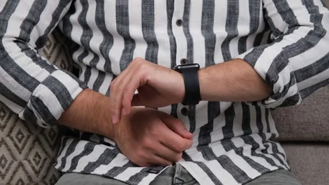 Man looking smartwatch 스톡 동영상 259632106