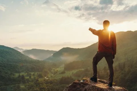 Man looking at sunset Stock Photos