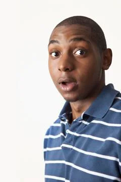 A man looking surprised, studio shot Foto stock