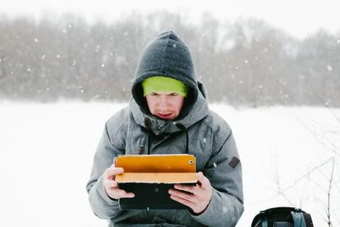 Man looking at Tablet Stock Photos