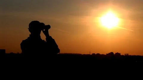 Man looking through Binoculars Stock Footage 8681256