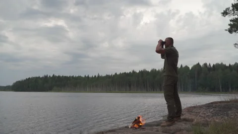 A man looking through binoculars Video stock 159131661