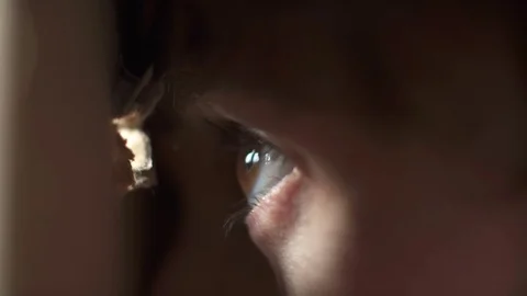 A man looking through a hole Stock Footage 70171375