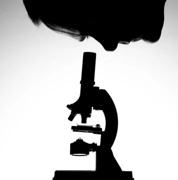 Man looking through microscope Stock Illustration