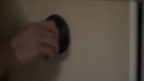 Man looking through old documents in file cabinet Stock Footage 107322366