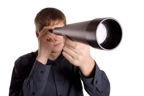 Man looking through a telescope Stock Photos