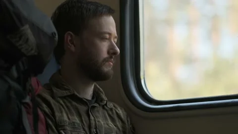 A man looking through the train window Video stock 136179831