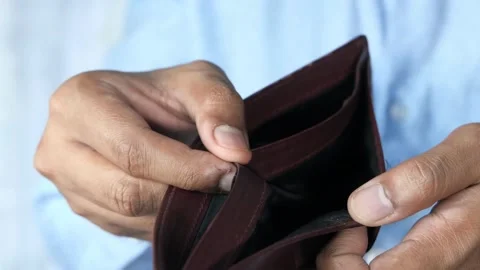 Man Looking Through Wallet Empty Of Cash, No Money and cards financial debt Stock Footage 336450596