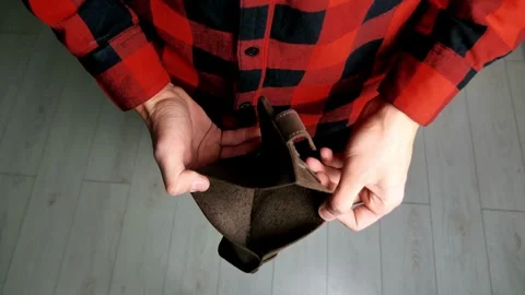 Man Looking Through Wallet Empty Of Cash, No Money and cards financial debt Video stock 336450608