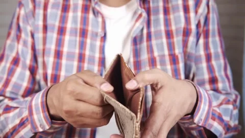 Man Looking Through Wallet Empty Of Cash, No Money and cards financial debt Video stock 336450623