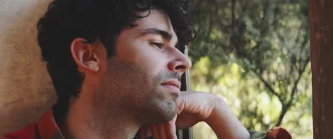 Man looking through window close up Stock Footage 202267261