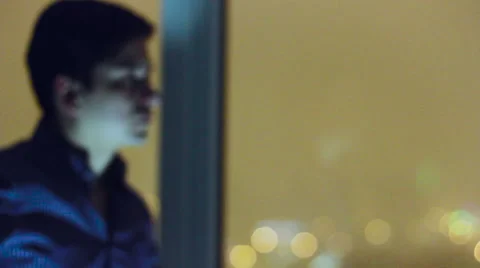 A Man Looking Through Window Stock Footage 60230964
