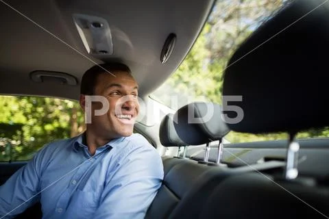 Man looking through windshield Stock Photos