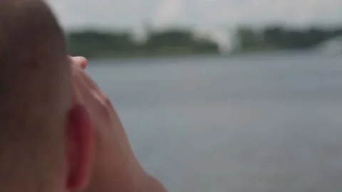 Man looking through a wine bottle Stock Footage 105960029