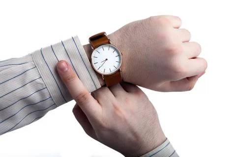 Man looking at the time close up Stock Photos