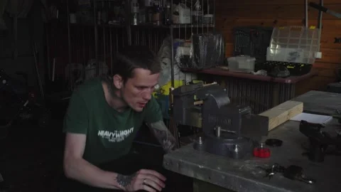 Man looking for a tool before work Stock Footage 137978426