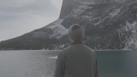 Man looking at top of mountain. Stock Footage