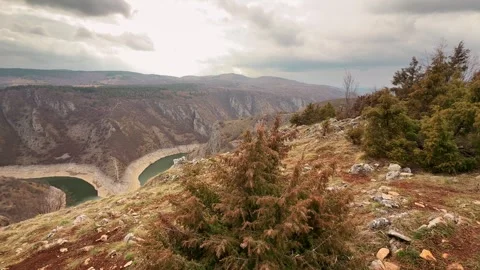 Man looking at Uvac River canyon Serbia scenic viewpoint travel destination 스톡 동영상 332167166