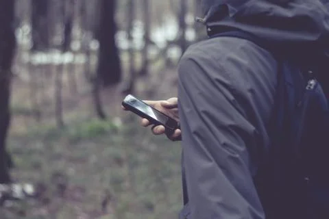 Man looking for a way in the forest Stock Photos