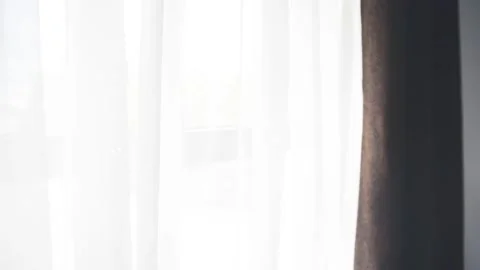 A man is looking on the window and smiles. Stock Footage 133316831