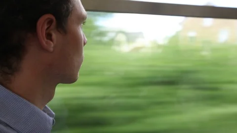 Man looking at window in moving train, close up Stock Footage 96127224