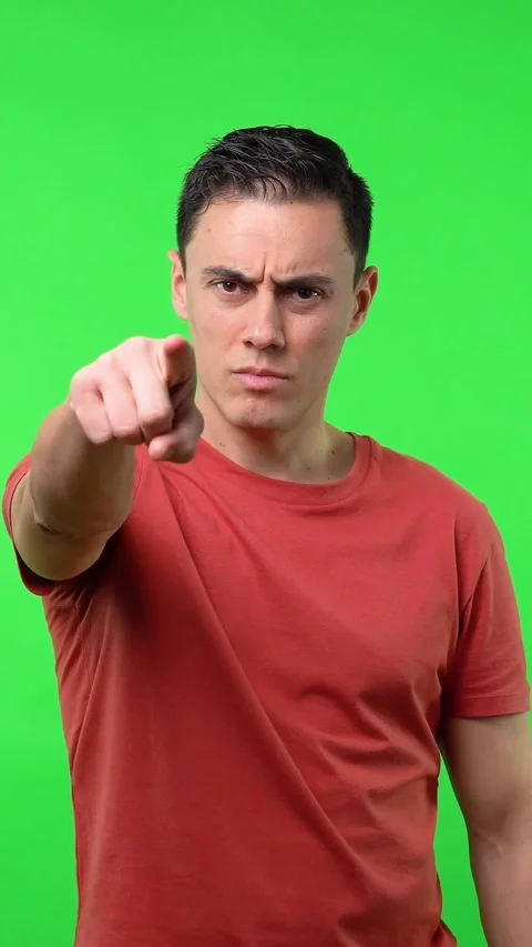 Man looking at you seriously and pointing his finger at you. Stock Footage 246992195