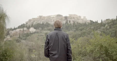 Man looks at Akropolis from afar Stock Footage 131974091