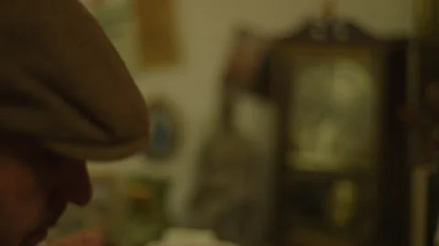 Man Looks Around While Trying to Crack a Code At a Dirty Desk Conspiracy Theory Stock Footage 219513905