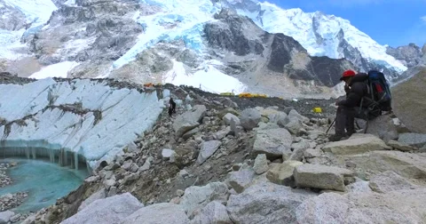 A man looks at the base camp of Mount Everest on the Nepal Stock Footage 66813104