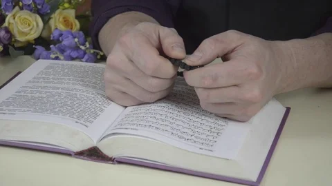 A man looks at a book Stock Footage 74195410