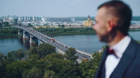 A man looks at the bridge. Stock Footage 161625051
