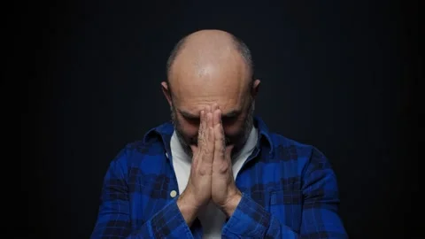 Man looks at the camera and begging, young man prays excitedly, Stock Footage 146517524