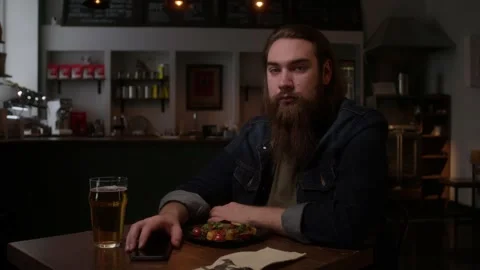 The man looks into the camera Stock Footage 223884140