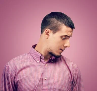 Man looks down Stock Photos