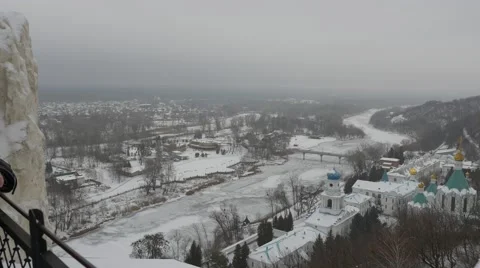 Man Looks Down at the Wintry Landscape Monastery on a Hill Holy Mountains Lavra Stock Footage 63176014
