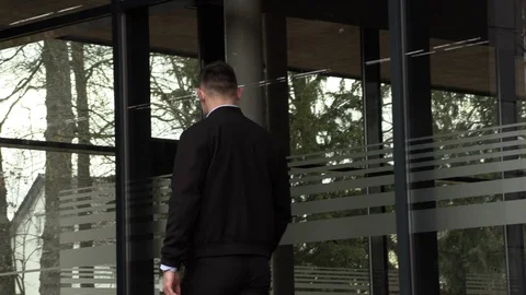 A man looks in an empty and closed cafe Stock Footage 126552331