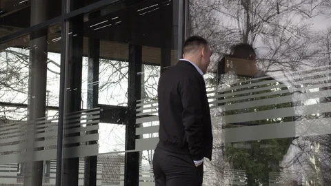 A man looks in an empty and closed cafe Stock Footage 126555547
