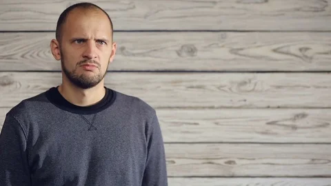 The man looks intensely into the camera Stock Footage 95995991