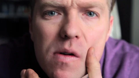 Man looks in the mirror Stock Footage 106029083