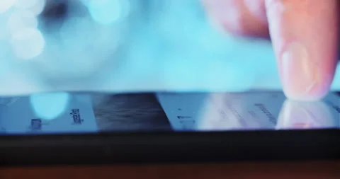Man looks for pictures using internet on contemporary phone Stock-Footage 149451030