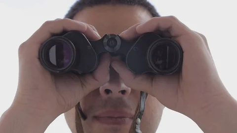 The man looks through binoculars 4 Stock Footage 76303625