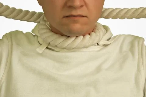 A man with a loop from a rope around his neck in a white sweater isolated on Stock Photos