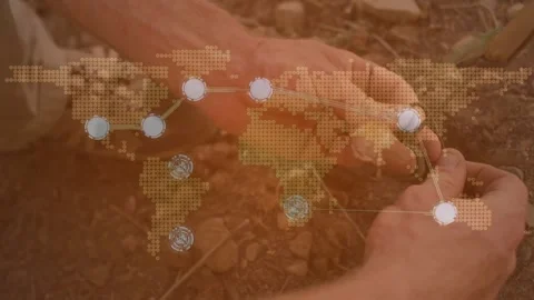 Man looping cord around stick on soil, securing knot illustrating technology Stock Footage 330717830