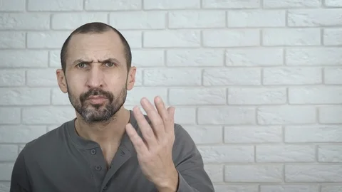 The man is at a loss. Stock Footage 106018516